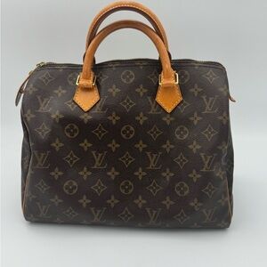 Louis Vuitton Speedy 30 in the signature Monogram Canvas.